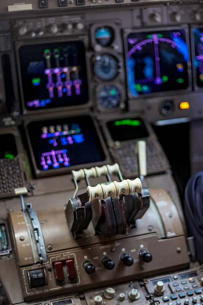 A vertical selective focus of airplane cockpit instruments on blurred background - Foto, imagen