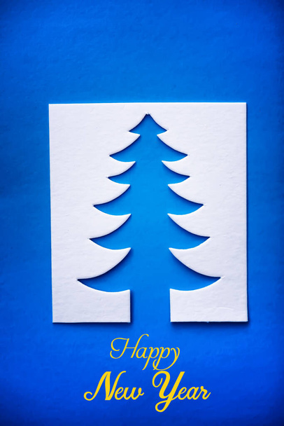 Christmas tree paper cutting design papercraft card. White, red and green colo - Foto, Imagen