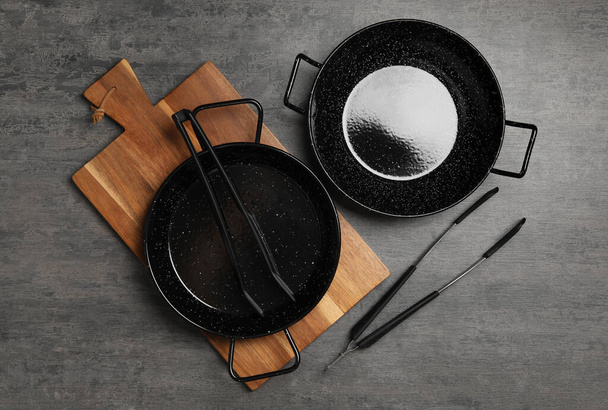 Set of cooking utensils on grey table, flat lay - Photo, image