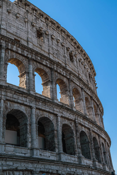 The famous Roman Coliseum on a sunny day in Rome, Italy - Photo, image