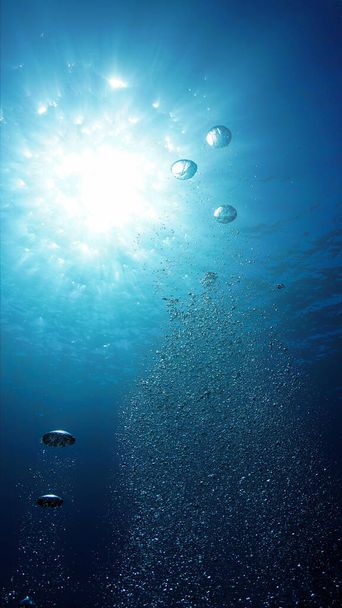 Artistieke onderwaterfoto van luchtbellen.  - Foto, afbeelding