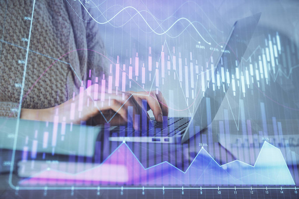 Double exposure of woman hands typing on computer and forex chart hologram drawing. Stock market analysis concept. - Fotó, kép