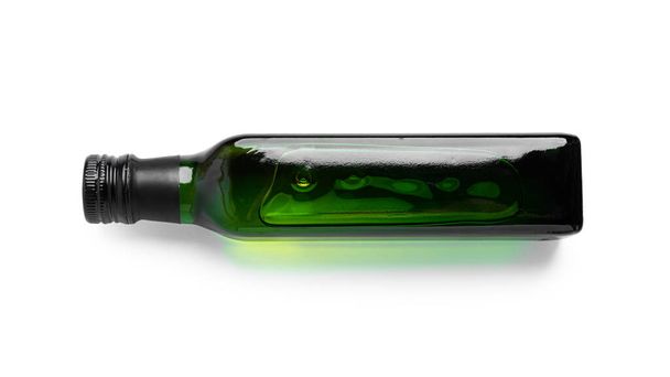 Green glass bottle with olive oil isolated on white background. High quality photo - Φωτογραφία, εικόνα