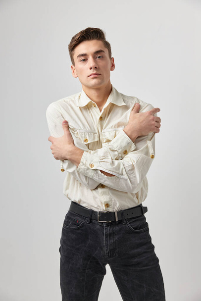 handsome man in white shirt casual wear fashion self confidence - Фото, зображення