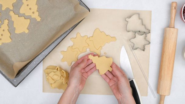 Chef placing cookies on baking sheet. Shortbread cookies with raspberry jam step by step baking process, flat lay - Photo, Image