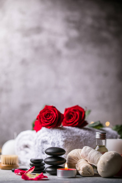 Wellness decoration, spa massage setting,  oil on stone background. Valentine's Day Zen and relax concept. - Photo, Image
