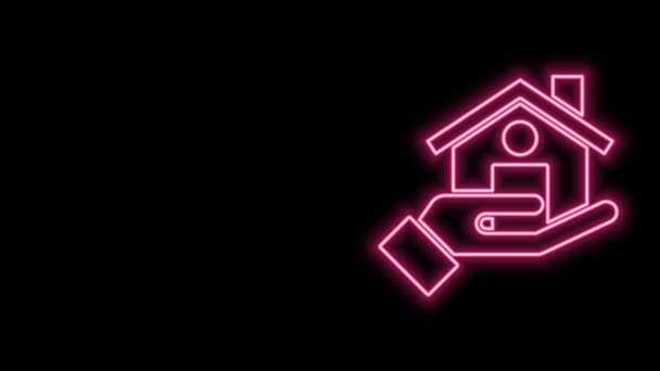Świecąca neonowa ikona nieruchomości odizolowana na czarnym tle. Kupuję dom. 4K Animacja graficzna ruchu wideo - Materiał filmowy, wideo