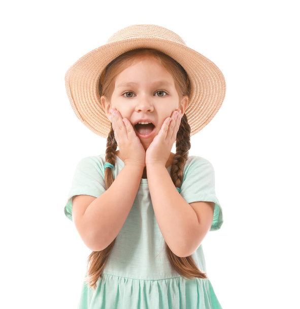 Portrait of surprised little girl on white background - Photo, Image