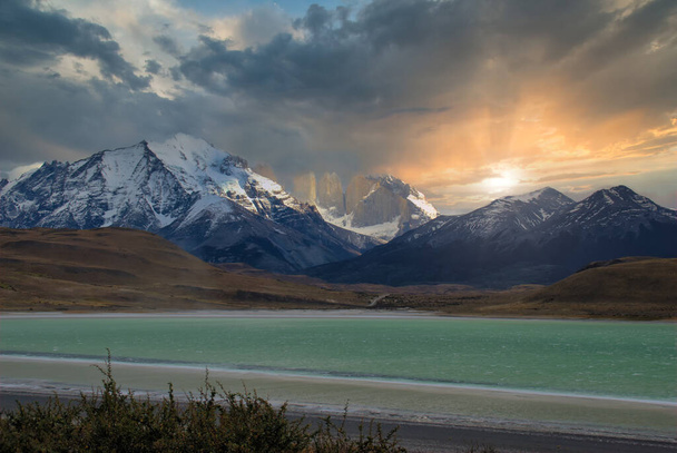 Sunset in Torres del Paine, Patagonia, Chile. In the foreground Lake Pehoe, in the background the Cuernos del Paine summits. - Photo, Image