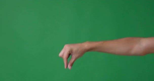 Hand grasp gesture over green screen - Footage, Video