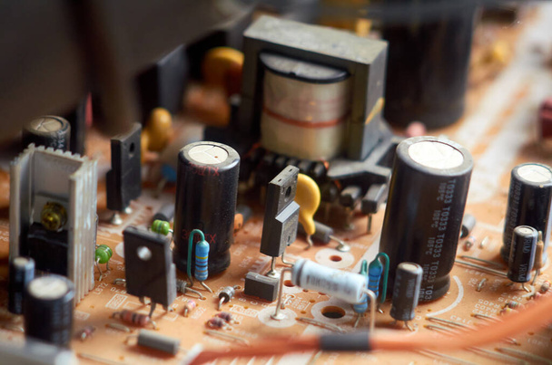 Resistors, capacitors and other electronic components of micro chip inside the TV close up - Photo, Image