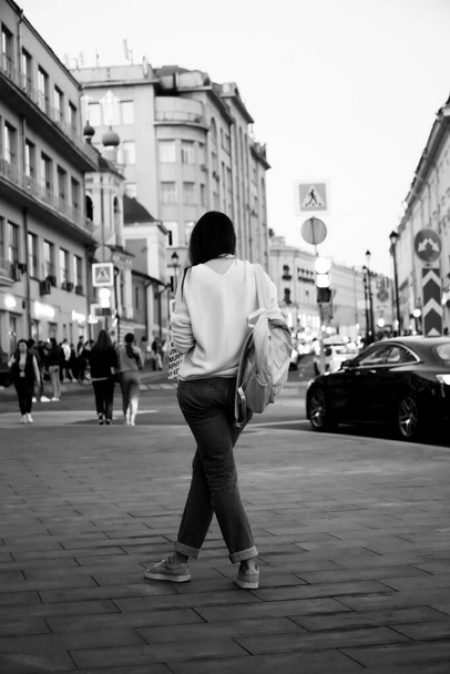 person walking on the street - Фото, изображение