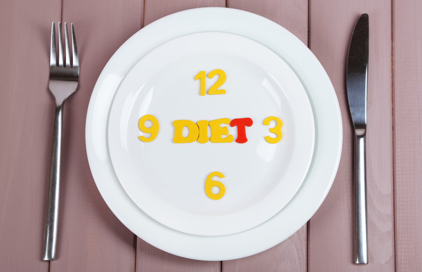Plate with inscription diet on wooden table close-up - 写真・画像