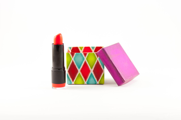 red lipstick in a festive package - Foto, immagini