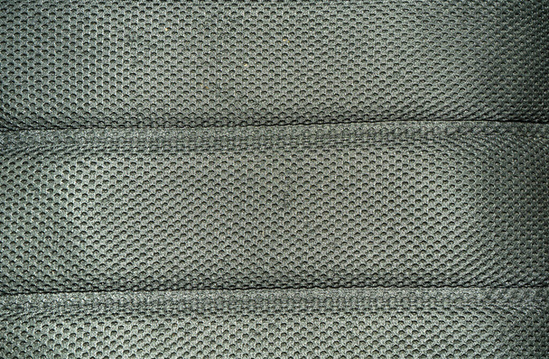 Textura de forro perforado suave para la parte posterior de la mochila que se adapta a la espalda. - Foto, imagen