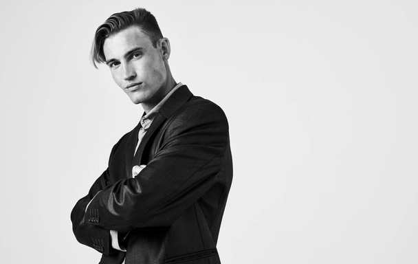 Portrait of a confident man in shirt and jacket black and white photograph cropped view - Foto, Bild