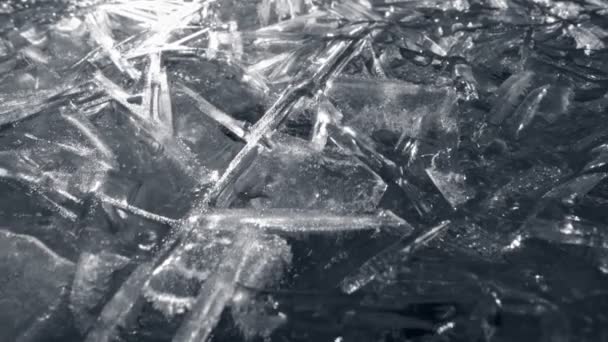 Ice surface. Frozen river surface in backlight. Ice particles - frozen water macro shot. High quality , UHD - Filmati, video