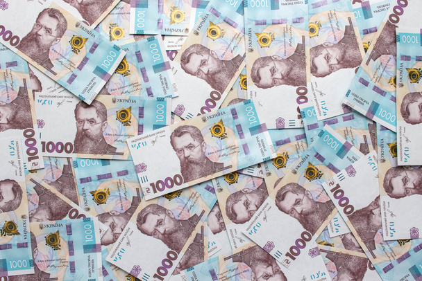 Tło 1000 banknotów hrywien, pełny ekran, zbliżenie. - Zdjęcie, obraz