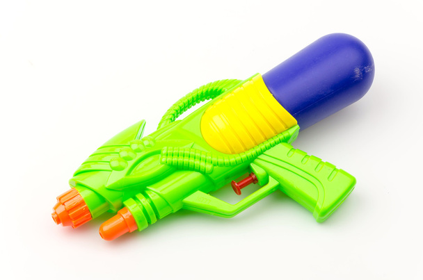 pistool water speelgoed geïsoleerd witte achtergrond - Foto, afbeelding
