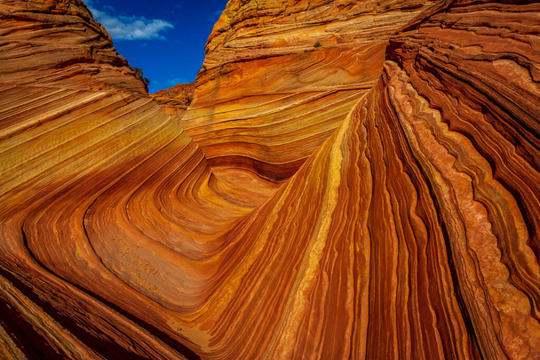 The Wave is a famous sandstone rock formation located in Coyote Buttes, Arizona, known for its colorful, undulating forms - Photo, Image
