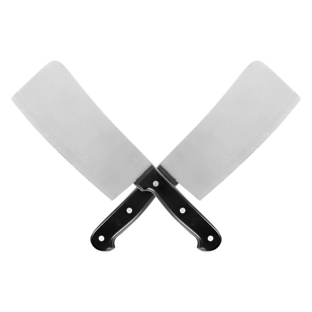 Akcesoria kuchenne - Skrzyżowane dwa duże noże kuchenne izolowane na białym tle. - Zdjęcie, obraz