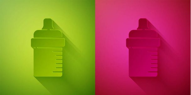 Paper cut Baby bottle icon isolated on green and pink background. Feeding bottle icon. Milk bottle sign. Paper art style. Vector. - Vector, Image