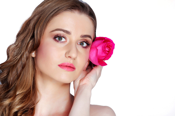 Portrait of young beautiful stylish woman with gorgeous pink ros - Фото, изображение