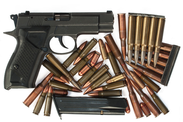 Handfeuerwaffe und Kugeln - Foto, Bild