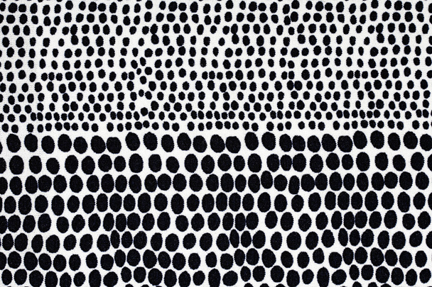 Tessuto bianco con punti neri, uno sfondo
 - Foto, immagini