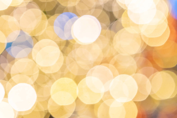 Festive background gold. abstract glitter bokeh blur lights. Defocused winter backdrop - Zdjęcie, obraz