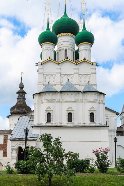 Russia, Rostov, July 2020. White stone Orthodox church against the background of the cloudy sky. - Fotografie, Obrázek