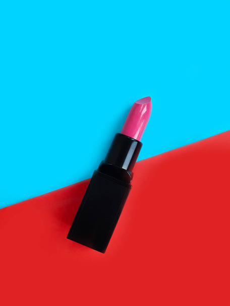 lipstick on colored background makeup beauty accessory - Foto, Imagem