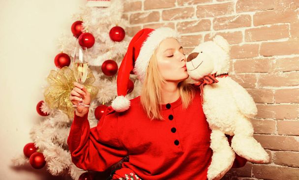 Smiling woman celebrating christmas. happy girl in santa claus hat. delivery christmas gifts. New year party. Merry christmas and happy new year. Fill our Christmas with joy and cheer - Foto, Imagen