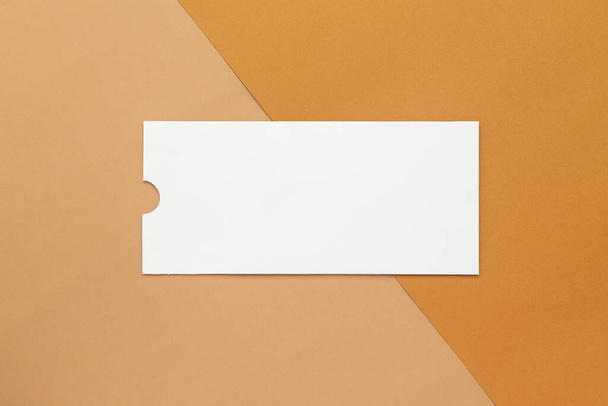Blank letter envelope mockup template on half beige and brown background. - Photo, Image
