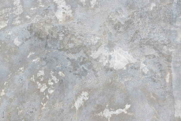 Concrete cement wall texture background in white grey with grunge weathered rough cracked pattern wallpaper - Fotó, kép