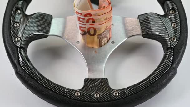 racing wheel with 50 euro banknotes - Footage, Video