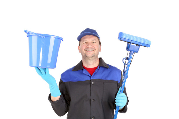Man in workwear with bucket and mop - Zdjęcie, obraz