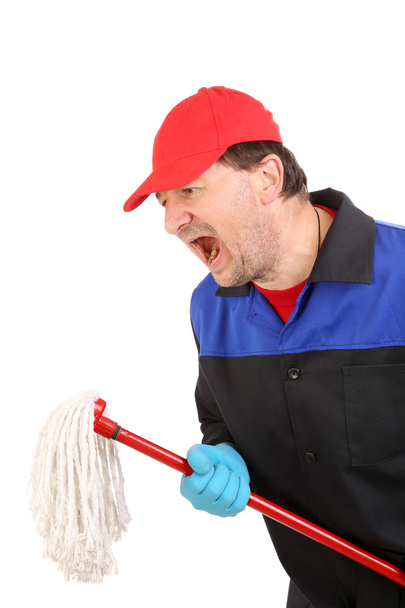 Angry Man in workwear with mop - Foto, afbeelding