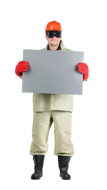 Welder in hard hat with paper - Photo, image