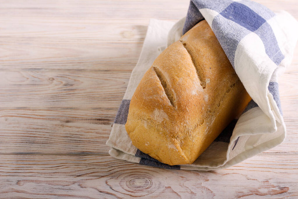 Homemade freshly baked loaf of bread - 写真・画像