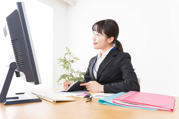 Business woman doing desk work - Photo, Image