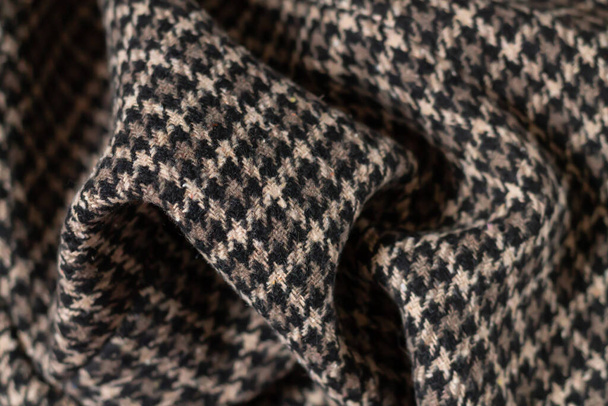 Braune, warme Wolle mit Hahnenfuß. Gewebte Dogstooth-Check Design-Hintergrund - Foto, Bild