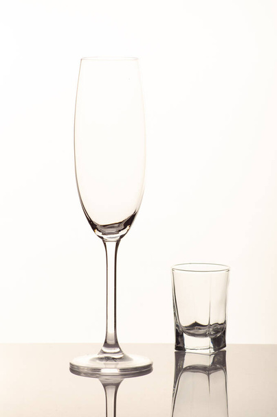 empty champagne glass jn white background - Foto, imagen