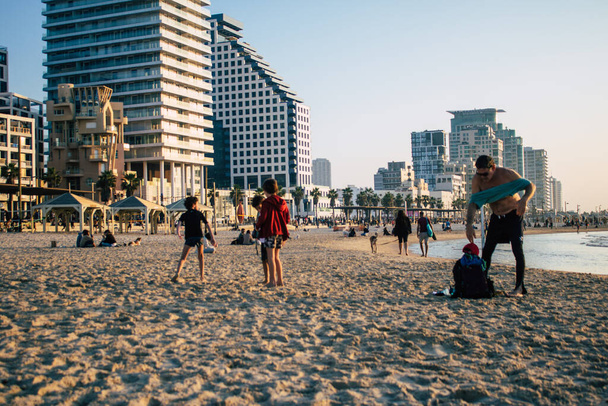 Tel Aviv Israel January 02, 2021 View of unidentified Israeli people having fun on Tel Aviv beach despite the city lockdown and the coronavirus outbreak hitting Israel - 写真・画像