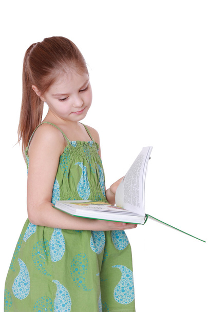 Girl holding green big book - Valokuva, kuva