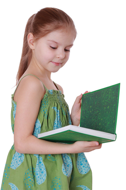 Little girl with green book - Zdjęcie, obraz