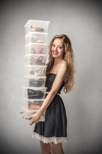 Woman holding lots of boxies - Valokuva, kuva