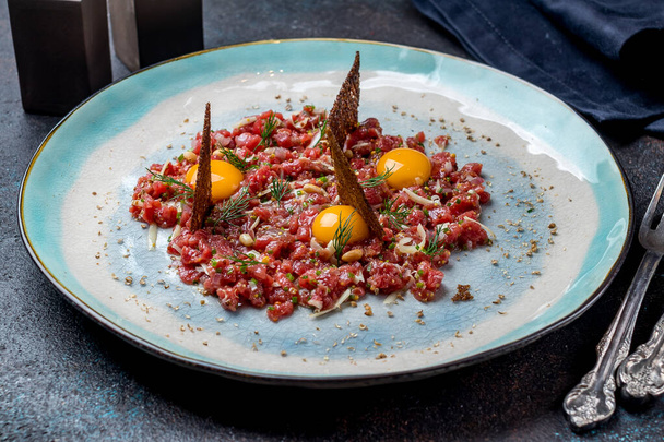 Tartare from beef, close up - Foto, afbeelding