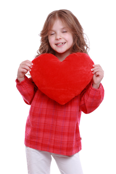 Girl holding a red heart - Photo, image