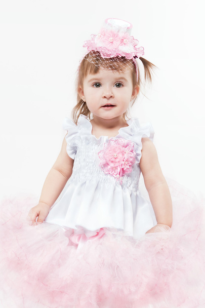 Little girl in beautiful pink dress - Фото, зображення
